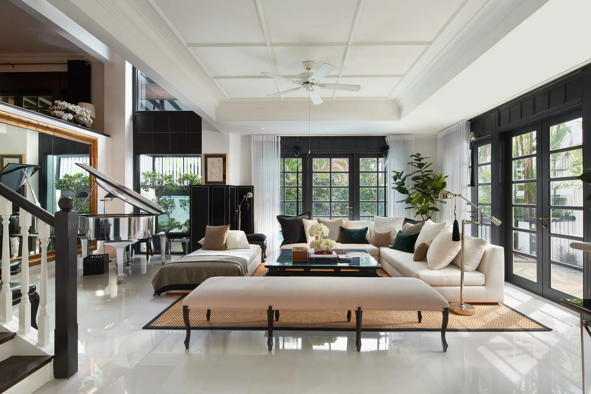 Light-filled living room with layered seating at a Coronation Road West home