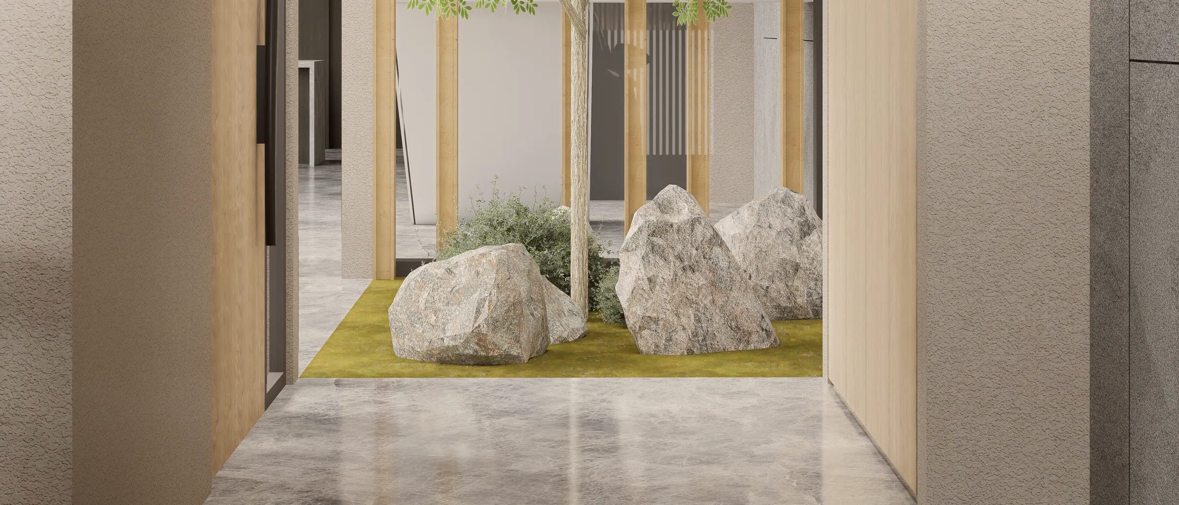 A stone-floored corridor at Lakme Street opening onto its interior rock garden.